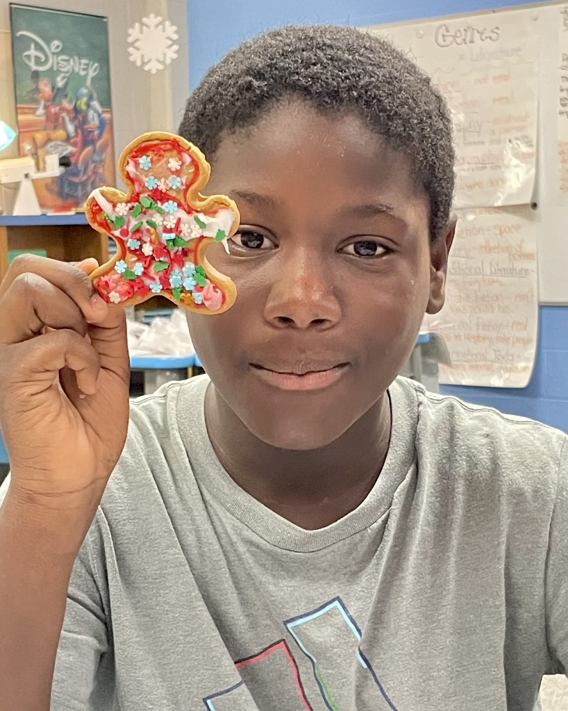 Student with gingerbread cookie